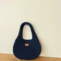 Solid color knitted shoulder bag, minimalist underarm handbag for women, casual daily style. - One Size / Navy Blue