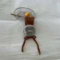 Detailansicht kuscheliger Winter Plüsch-Ohrwärmer mit weichem Vlies und eleganter Schleife. - Einheitsgröße / Kürbis