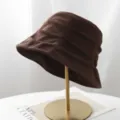 Brown corduroy bucket hat detail showing soft texture, pleated design, and elegant brim close-up. - M (56-58cm) / Coffee