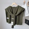 Dark green wool blend knitted shawl detail, stylish tied collar design, perfect for layering. - Army Green Striped Shawl with Wool