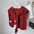 Dark red knitted wool blend shawl, stylish tied front design, versatile winter outer wear. - Red Striped Shawl with Wool