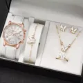 Vista di dettaglio set orologio donna con collana orecchini anello e cinturino bianco. - Set Orologio Collana Quadrante Rosso Oro