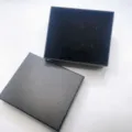 Detailed view of black jewelry gift box interior with custom slots for watch and rings. - Lid And Base Box / Black