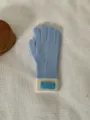 Blue and white knit gloves detail view, soft winter warm touchscreen gloves with cuff label. - One Size / Blue