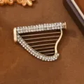 Vintage rhinestone harp brooch pin, elegant gold tone musical instrument coat accessory for women. - Musical Instrument Series - Harp