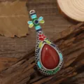 Vintage ethnic style pipa brooch with colorful enamel and red synthetic gemstone. - Goldstone Pipa Brooch