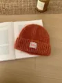 Cozy orange knit beanie hat with fabric label, soft stretch winter warm solid color cap for women. - One Size / Orange