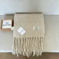 Cozy winter wool-blend scarf for women, featuring a soft shearling texture and chic fringe design. - Beige