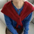 Women red knit crossover shawl with buttons paired with blue cardigan, elegant winter outer. - Angola Red