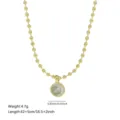 Vue détaillée du collier en chaîne de perles dorées avec pendentif rond en zircon brillant. - Chaîne à billes modèle 1 – ronde