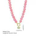 Rosa Acryl Harz Perlen Halskette mit Zirkon Anhänger und Metallverschluss für Damen. - Halskette mit Anhänger / Rosa