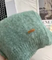 Gemütlicher Alpakagemisch Strick-Winterschal mit Lederlabel Detail, weich, warm und schick. - Seeblau