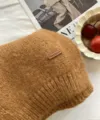 Gemütlicher Alpakagemisch einfarbiger Strickschal Detailansicht, weicher Winterschal Unisex - Kürbisorange