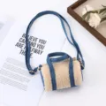 Close-up detail view of the cute mini plush and denim crossbody bag with dual handles. - Khaki