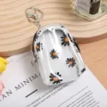 Clear mini backpack keychain with cute daisy flower print, portable coin purse and wallet. - Style 2