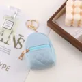 Blue quilted mini backpack keychain, cute coin purse, portable earphone storage bag accessory. - Blue