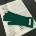 Dunkelgrüne melierte Wollstrickhandschuhe für Damen, warme Winterhandschuhe mit Woll-Etikett. - Einheitsgröße / Dunkelgrün