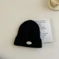 Bonnet en tricot noir pour enfants avec patch élégant, bonnet d'hiver uni et chaud. - S / Noir