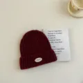 Bonnet en tricot chaud pour enfants en hiver, bonnet bébé uni confortable avec patch. - S / Bordeaux
