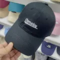 Classic black soft-top baseball cap with white Consice embroidery, casual fashion style. - M (56-58cm) / Black