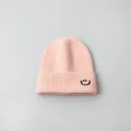 Kids pink knit beanie hat with cute black smiley embroidery for autumn winter season - Hat / Pink