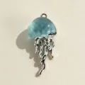 Close-up detail of a charming blue jellyfish pendant, silver metal tentacles, artistic jewelry. - Jellyfish Pendant Accessory / Blue