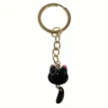 Cute black cat keychain with gold ring, metal chain and movable tail design charm accessory. - Waving Tail Cat Keychain / Black