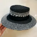 Black and white woven straw hat detail, chic retro flat top design with a wide brim for summer. - M (56-58cm) / Black