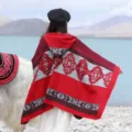 Ethnic style winter knitted hooded cape shawl outdoor scenic travel photography detail view. - Persian Stripe Hooded Poncho, Red