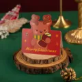 Bonita tarjeta de felicitación navideña con diseño de reno, ideal para deseos y regalos. - Reno De Navidad (Con Sobre)