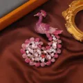 Retro crystal rhinestone peacock brooch pin for women luxury winter sweater clothing accessory - Pink