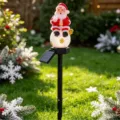 Solar outdoor Christmas LED ground stake light waterproof yard garden landscape lawn lamp - Santa Claus Sitting on Ball (Shatterproof)