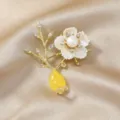 Elegant pearl flower branch brooch with yellow drop, chic fashion coat pin jewelry accessory. - Imitation Shell Topaz Vase Brooch / Yellow