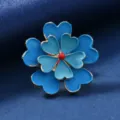 Blue double layer heart petal flower brooch pin with red center and elegant metal trim accessory - Double-Layer Clover Style / Blue