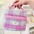 Ins fresh plaid bucket cosmetic bag, portable large capacity toiletry and storage bag detail view. - Peach Stripe