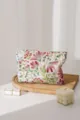 Detailed close-up of floral embroidered cosmetic bag with lovely cosmos pattern and zip. - Red Flowers Green Leaves / L