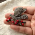 Vintage rhinestone peace dove brooch, elegant red berry design for women's coat accessories. - White