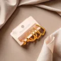 Detailed closeup of golden stainless steel hoop earrings set, minimalist geometric daily wear. - Rectangle Style (ZE0769)