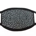Detailed view of black double-layer cotton face mask covered with sparkling rhinestone crystals. - One Size / White Zircon