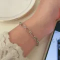 Minimalist silver paperclip chain bracelet for women, daily versatile jewelry style. - Geometric Ring Link Chain Style (MY35324)