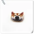 Detailed view of the 3D cartoon Shiba Inu dog head plush brooch badge accessory. - Smiling Shiba Inu