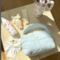 Blue towel cloth cosmetic bag, soft terry fabric makeup pouch with floral accent. - Blue Plush