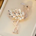 Exquisite rhinestone flamingo brooch detail, featuring sparkling crystals and rose gold tone. - 60*40mm / White