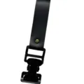 Black leather glove clip detail with metal buckle for outdoor motorcycle riding. - Black