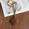 Brown PU leather heart-shaped bag charm, chic keychain and pendant accessory for women. - Brown