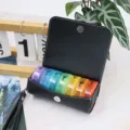 Portable weekly pill organizer with PU leather case 7 day vitamin storage box compact - Black + Multicolor Box