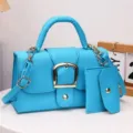 Schicke hellblaue quadratische Mini-Handtasche mit passender Münztasche - Dunkelblau