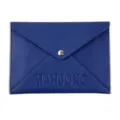 Blue PU leather mahjong storage bag detail, featuring embossed letters and a gold snap closure. - Blue