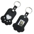 Portable cat paw PU leather keychain with pet hair storage pocket and photo frame design. - Black