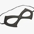 Close-up of black PU leather superhero eye mask detail, smooth texture with elastic strap. - Style 1 / Black